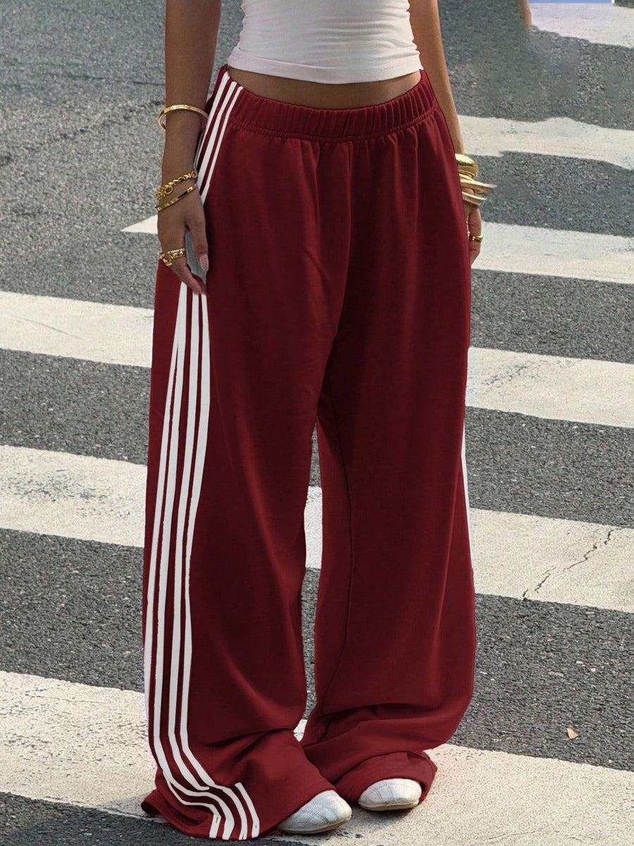 Burgundy track pants