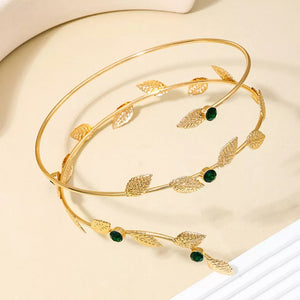 bracelet in gold featuring rhinestone embellishment and fitted fit