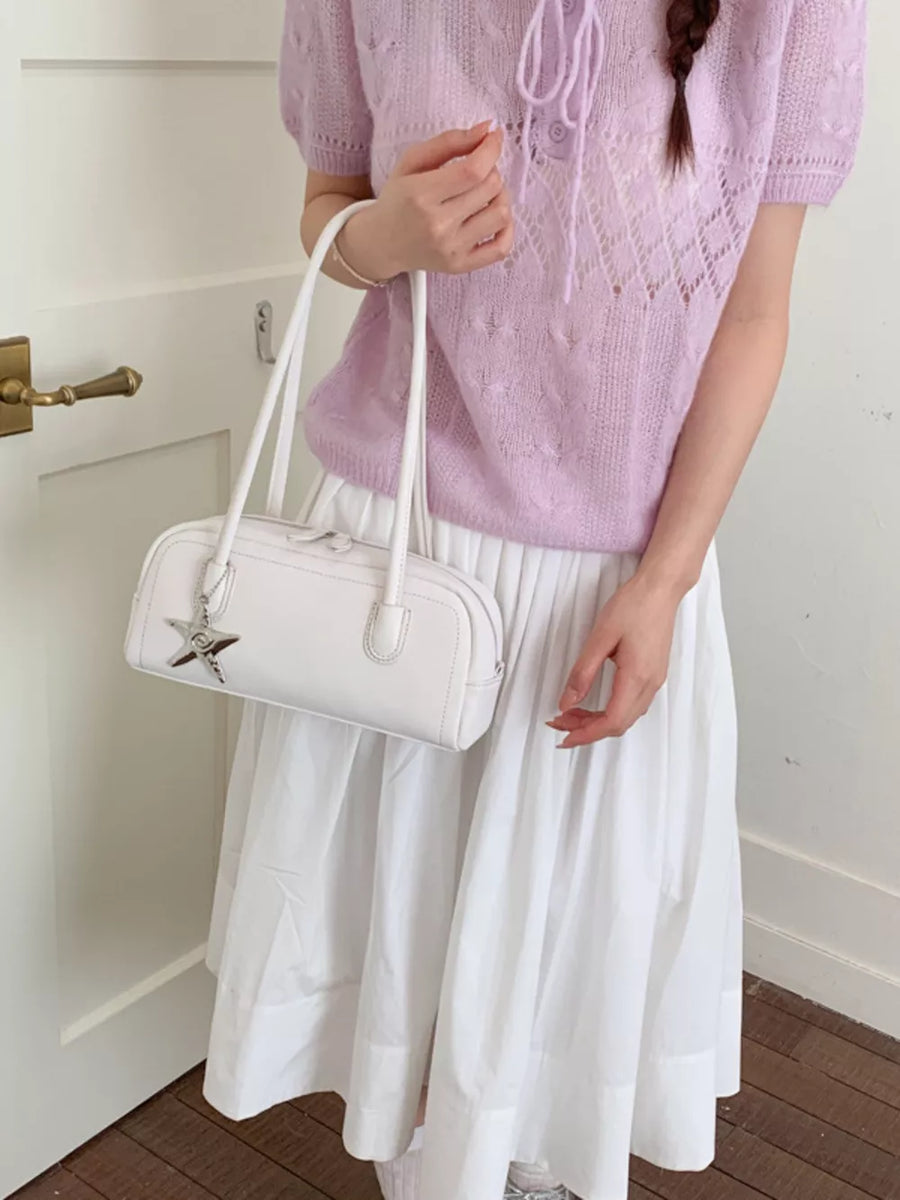White leather shoulder bag with star charm detail