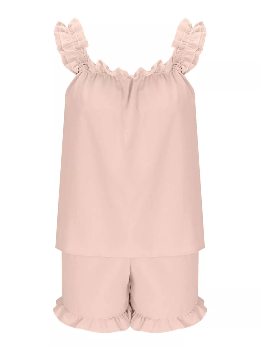 Pale blush ruffled pajama set with a cami and shorts.