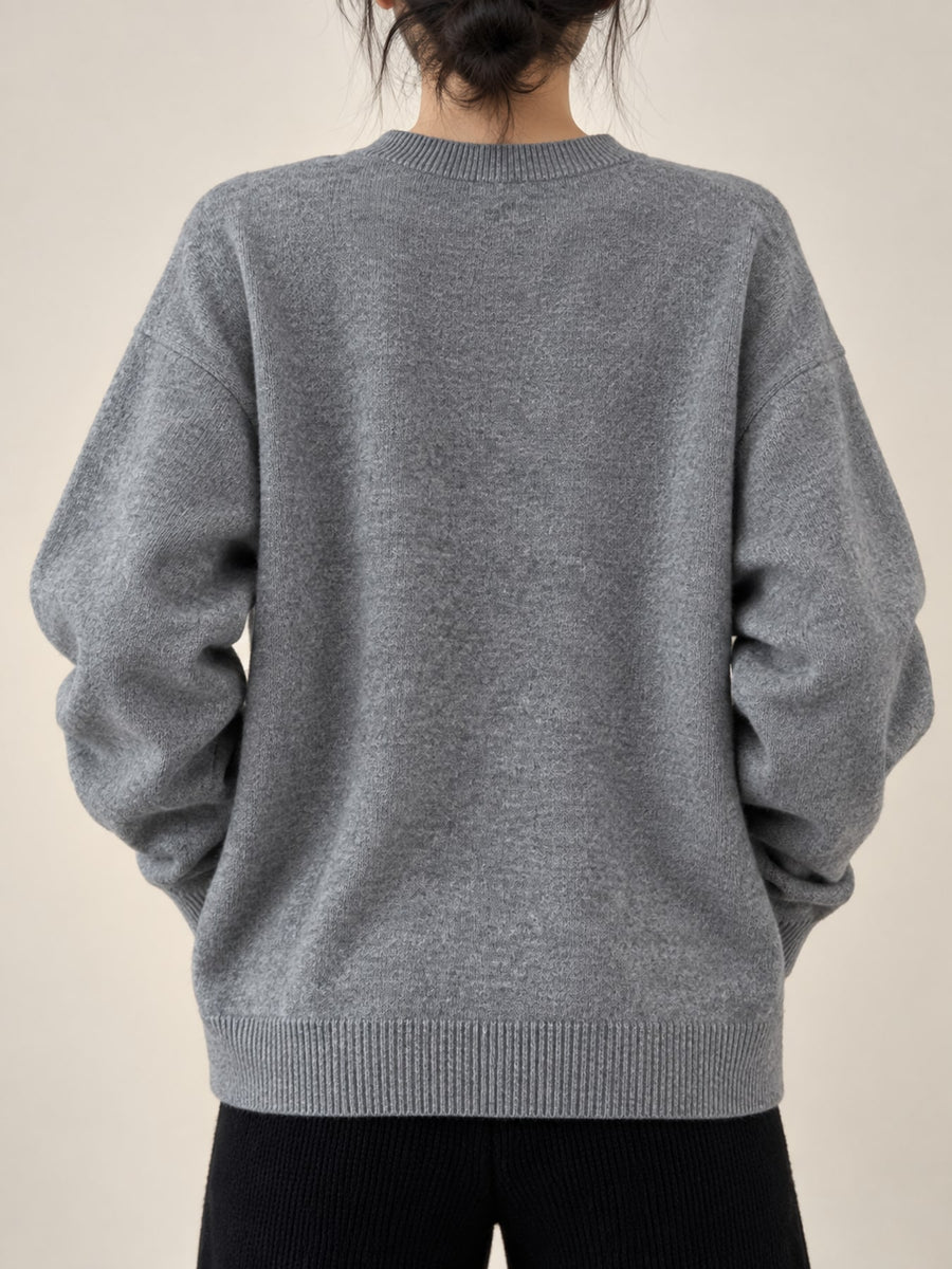 Wool content is 95% or greater cardigan in Gray with oversized silhouette