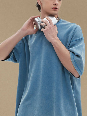 Dusty Blue half sleeve t-shirt with relaxed fit and contrast stitching detail.