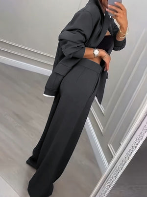 100% polyester Care instructions: Machine wash cold pantsuit in charcoal with relaxed silhouette
