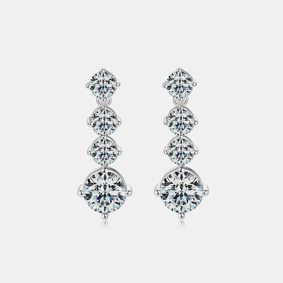 Silver cascade drop earrings with cubic zirconia stones.