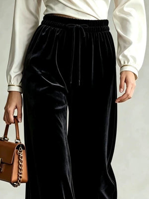 wide-leg pants in blush pink with drawstring waist and full-length