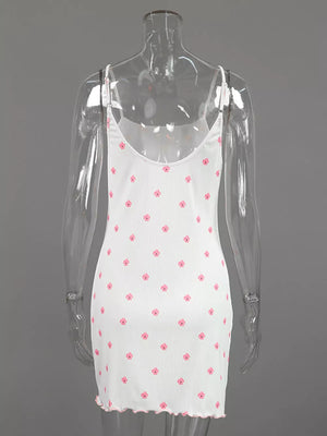 wrap dress in cream with ruffled hem and mini