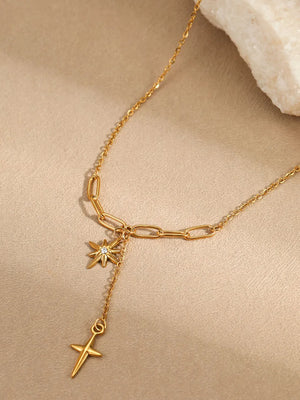 necklace in clear with star and cross pendant and pendant