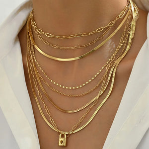 necklace in gold featuring multi-layer and layered fit