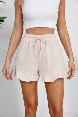 Sand linen blend shorts with drawstring waist and flounce hem