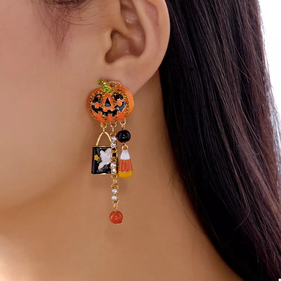 black earrings featuring dangle and novelty