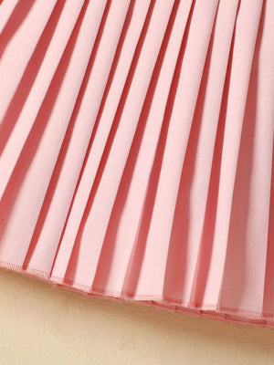 Pink pleated skirt with decorative hem detail