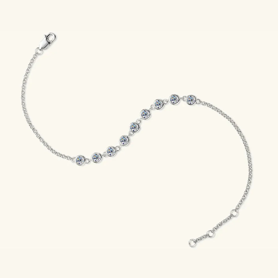 Silver bezel-set moissanite tennis bracelet with adjustable clasp