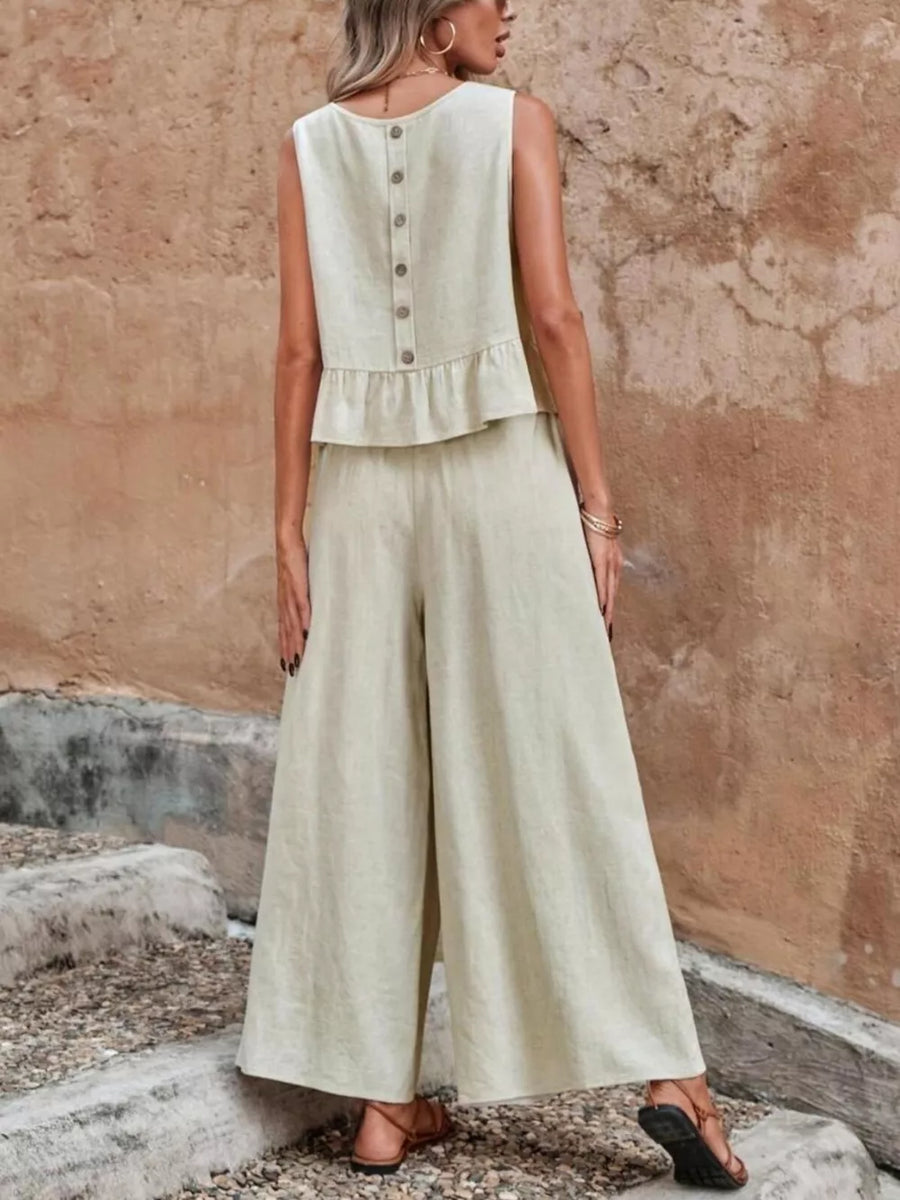 Beige ruffled peplum top with button back and wide-leg pants set