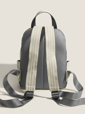 Gray backpack with zip-front and geometric
