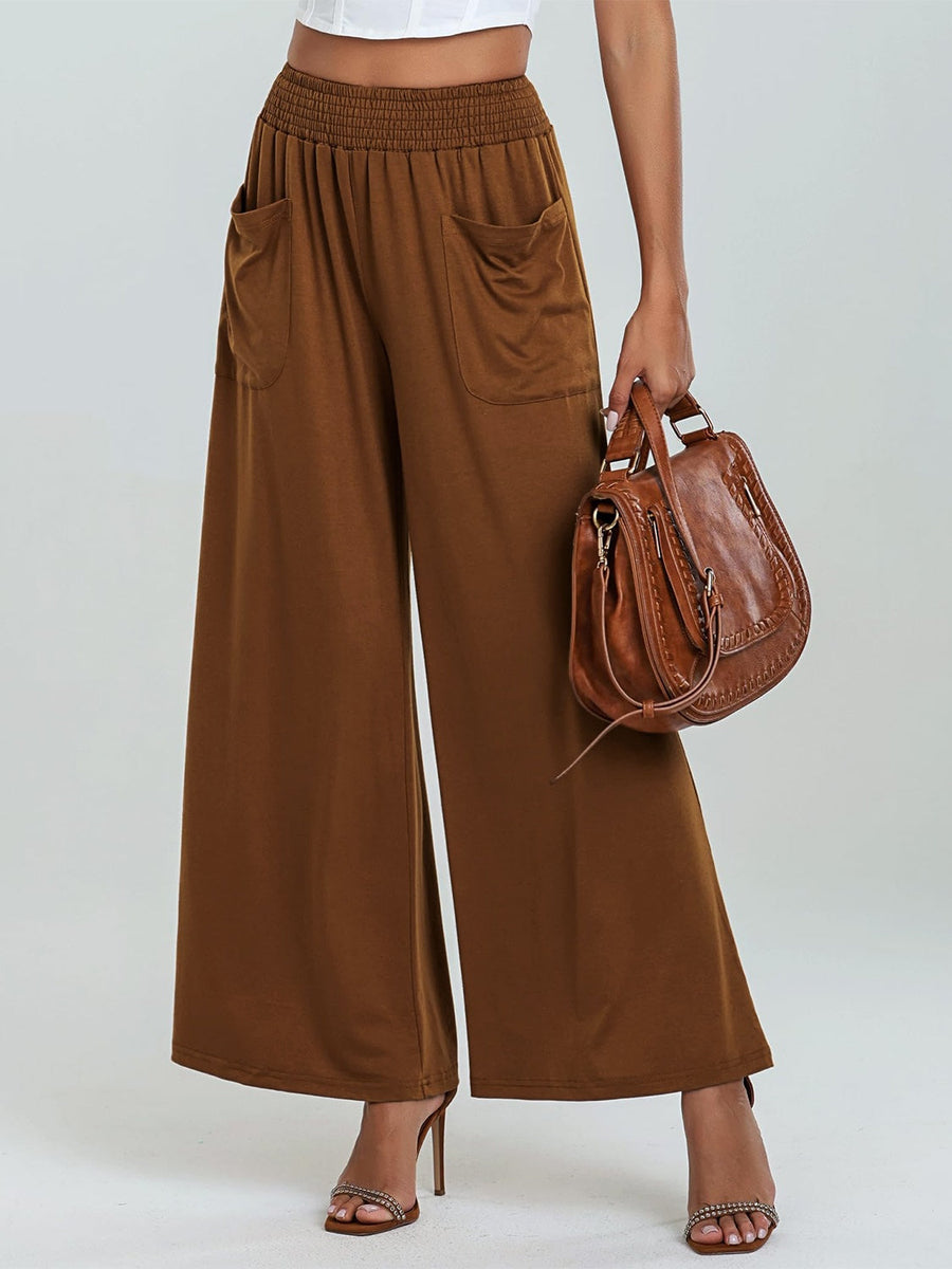 Caramel elastic waist palazzo trousers with pockets and wide legs.