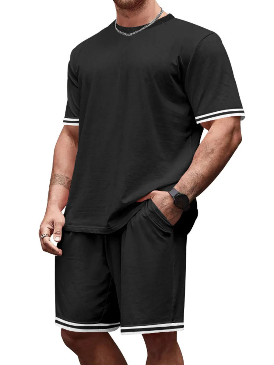 Black t-shirt and shorts set with white stripe trim on sleeves and hem.