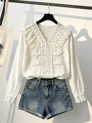100% polyester Care instructions: Machine wash cold blouse in ivory with regular silhouette