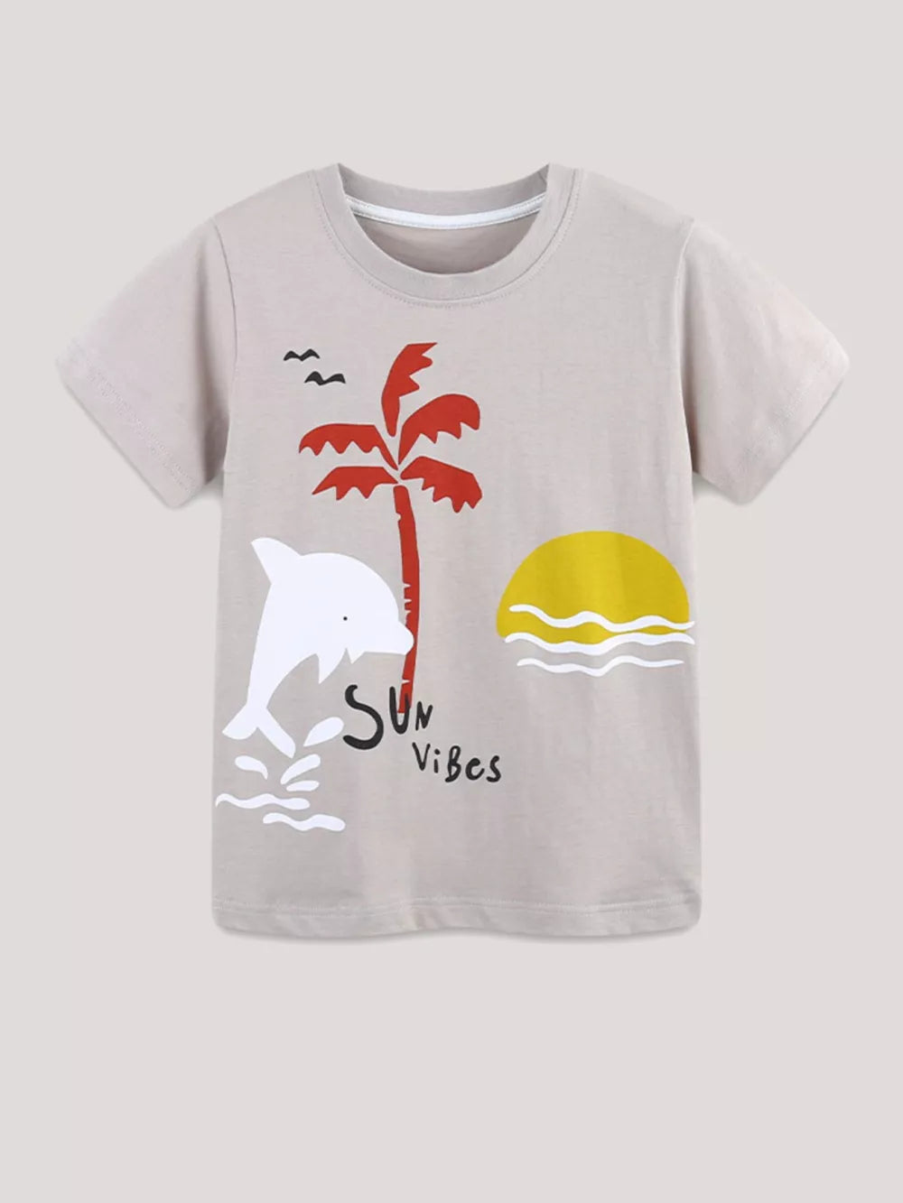 Kids' beige cotton graphic t-shirt with dolphin, palm tree, and sun print.