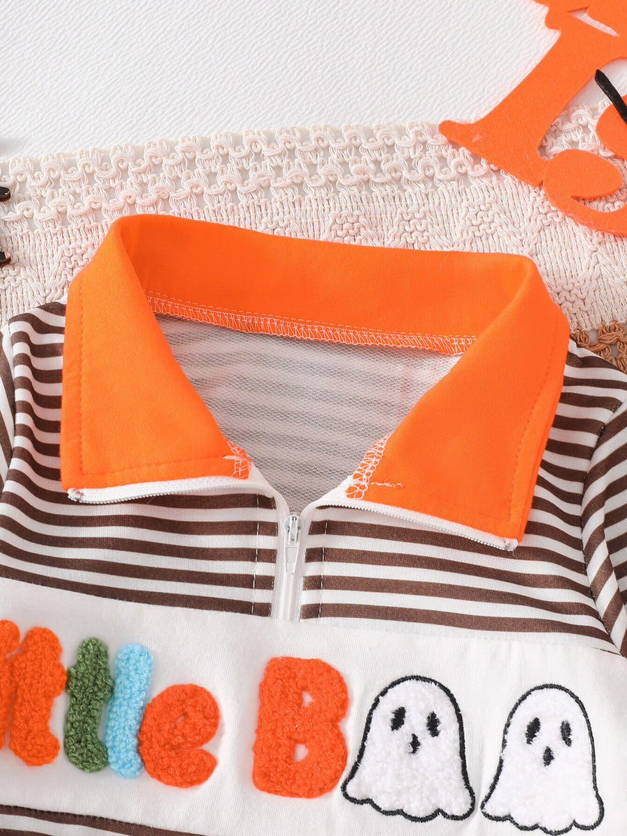 white sweatshirt featuring chenille patch and striped