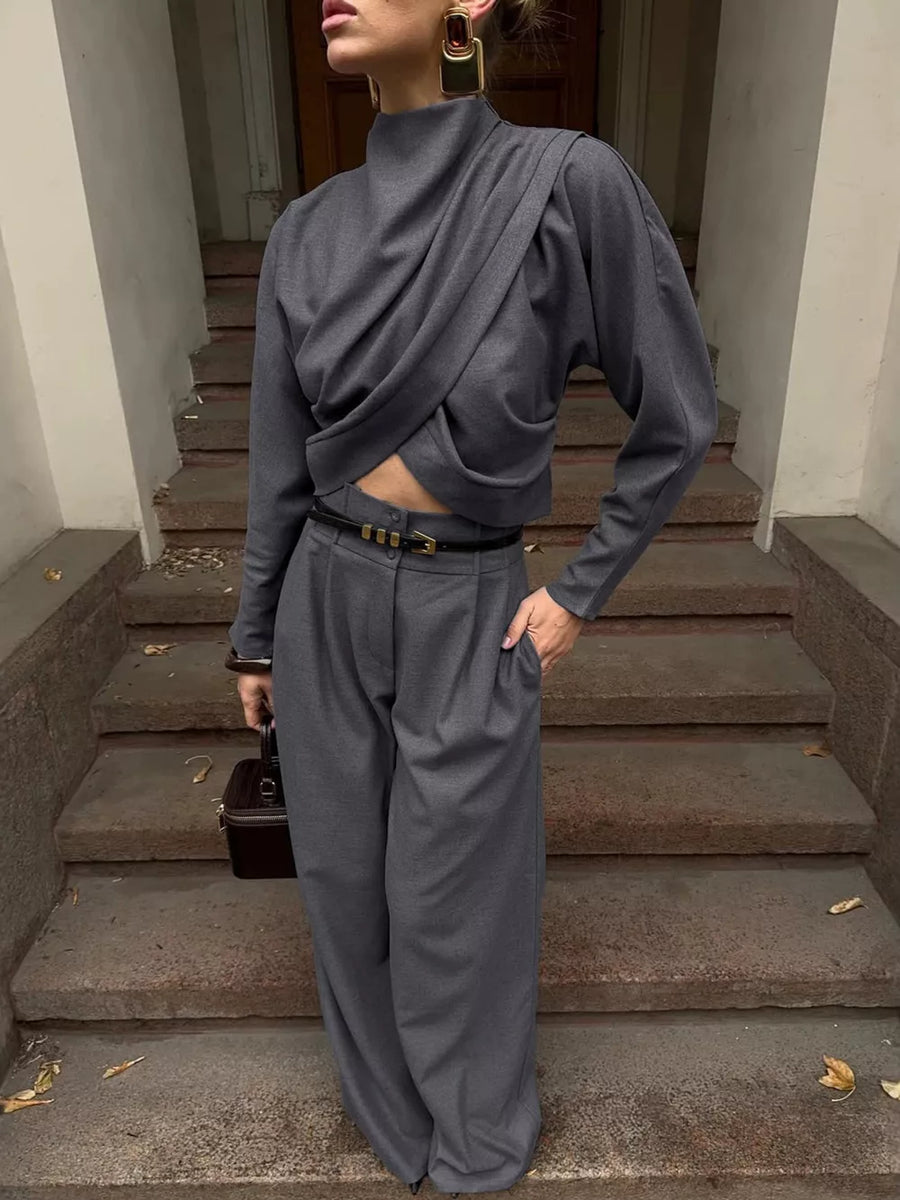 80% Polyester 20% Viscose Care instructions: Machine wash cold two-piece set in charcoal with relaxed silhouette