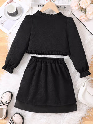 Black ruffle trim top and skirt set with long sleeves and elastic waist.