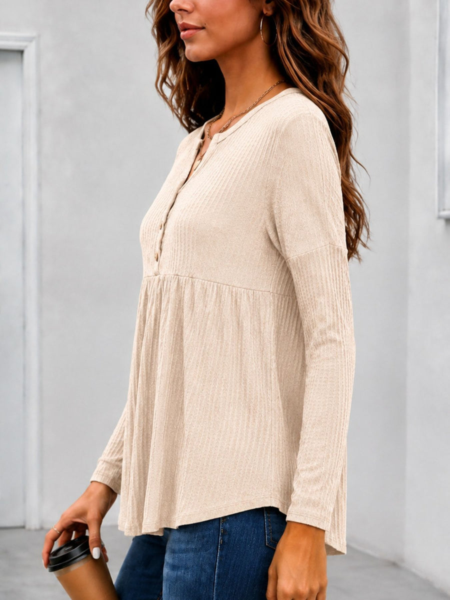 Beige peplum top with half-button and waffle-knit