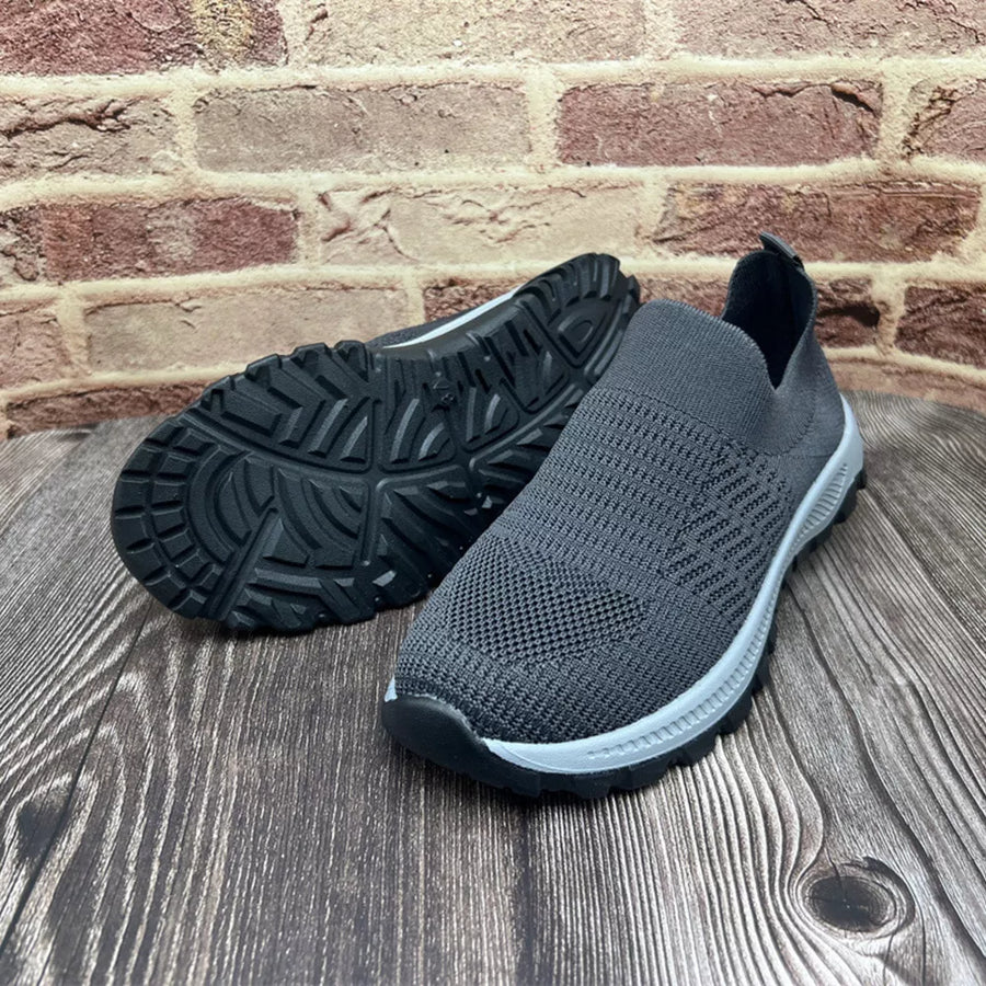 Grey breathable round toe slip-on sneakers with textured sole