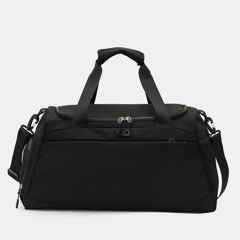 Black duffel gym bag with dual handles and a detachable shoulder strap