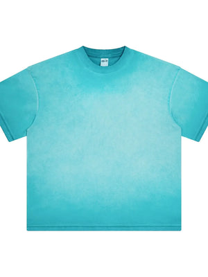Pigment-dyed oversized tee in Pastel Blue with a faded effect, crew neck, and short sleeves.