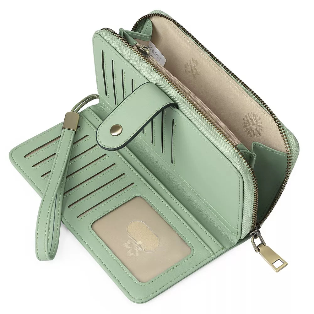 Sleek pu leather mini wallet in gum leaf with snap closure, card slots, and wrist strap.