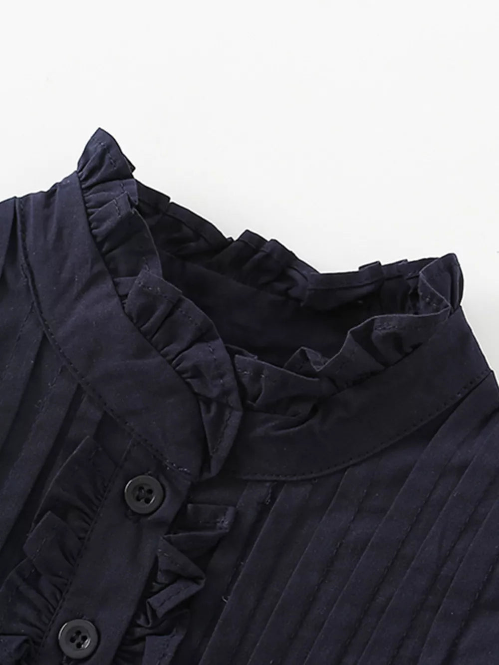 Navy cotton blend toddler dress with ruffle collar and button front detail.
