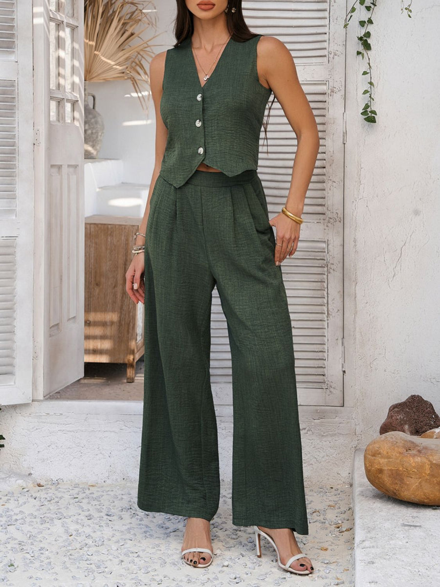 Dark green textured crop vest and wide leg pants set with button detail.