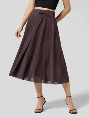 Flowy midi skirt in Coffee with drawstring waist and shorts liner.