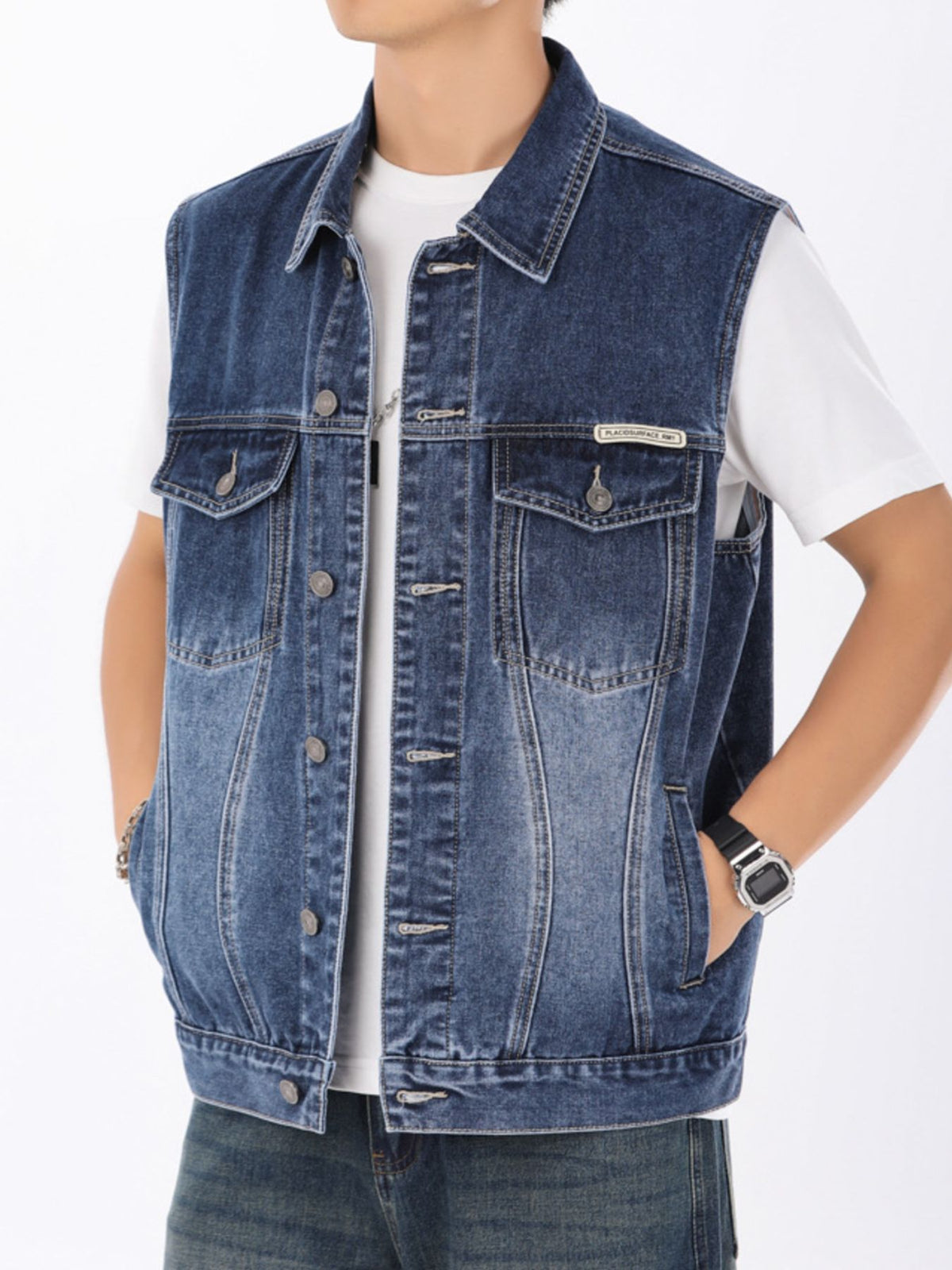 Men's vintage washed denim vest with button-down front and chest pockets.