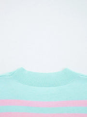 Multicolor striped cropped sweater with a ribbed mock neck.