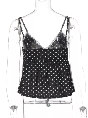 Black polka dot cami with lace trim and adjustable straps.