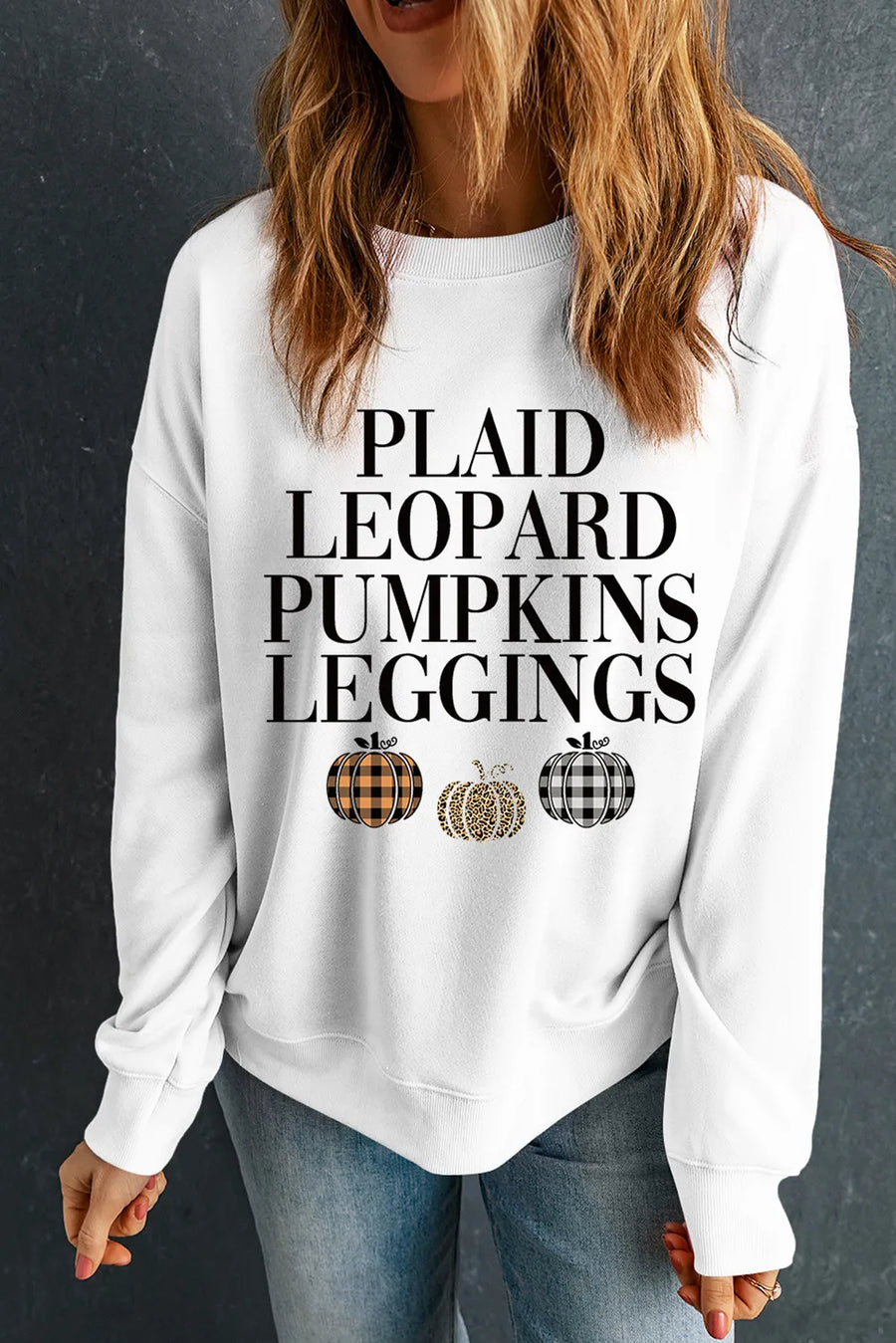 White round neck sweatshirt with plaid and leopard pumpkins graphic print