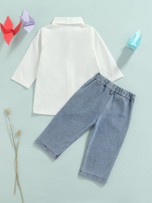 Toddler white long sleeve button-up shirt and light wash denim jeans set.