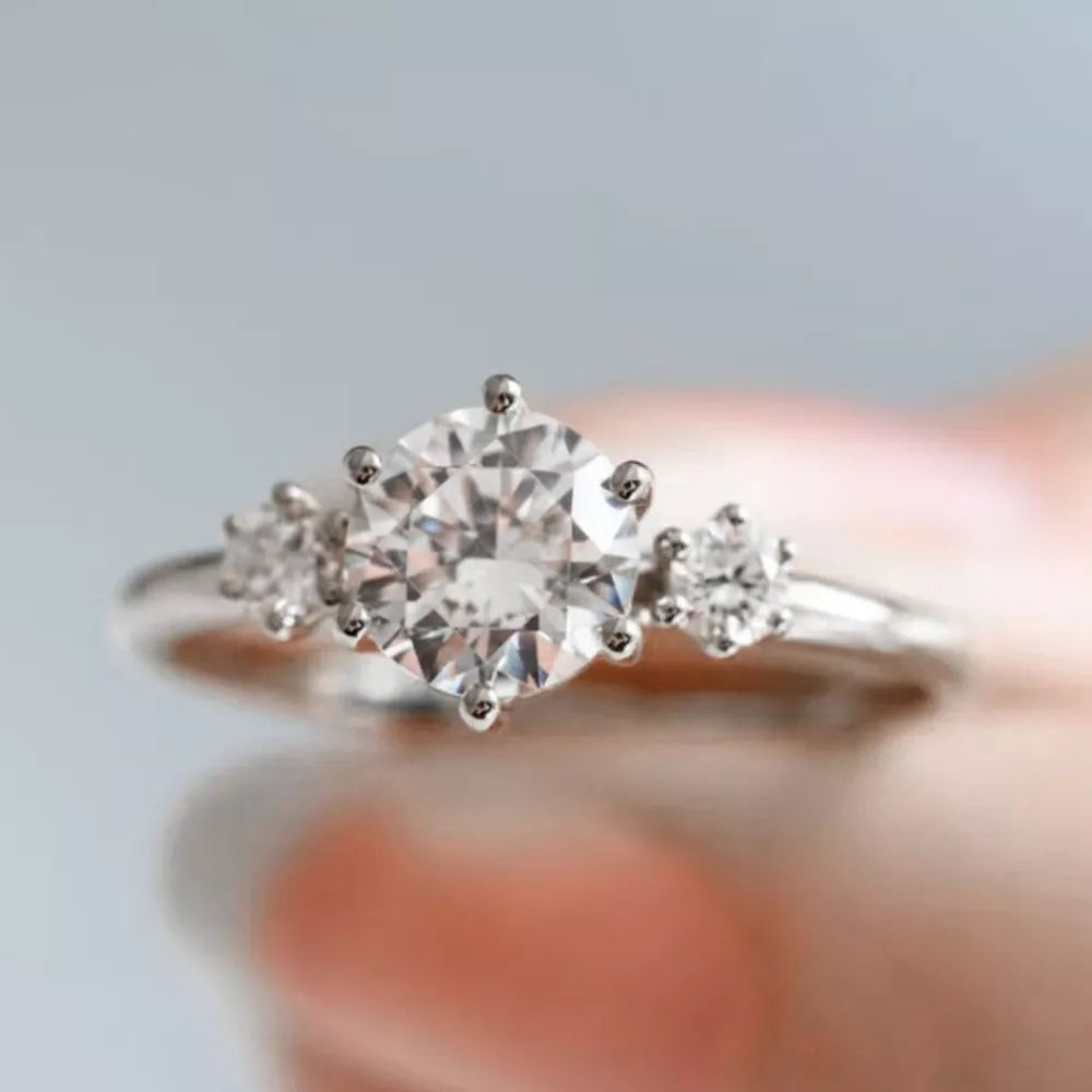925 sterling silver,Moissanite Care instructions: Avoid wearing during exercise, ring in clear with fitted silhouette