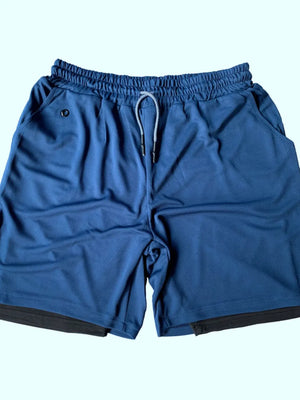 Blue dual-layered performance shorts with drawstring waist and phone pocket detail.