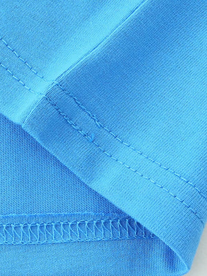 Blue cotton t-shirt detail showing stitching and fabric texture.