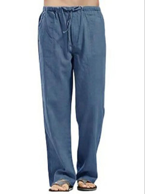Relaxed fit dusty blue linen drawstring trousers with pockets.