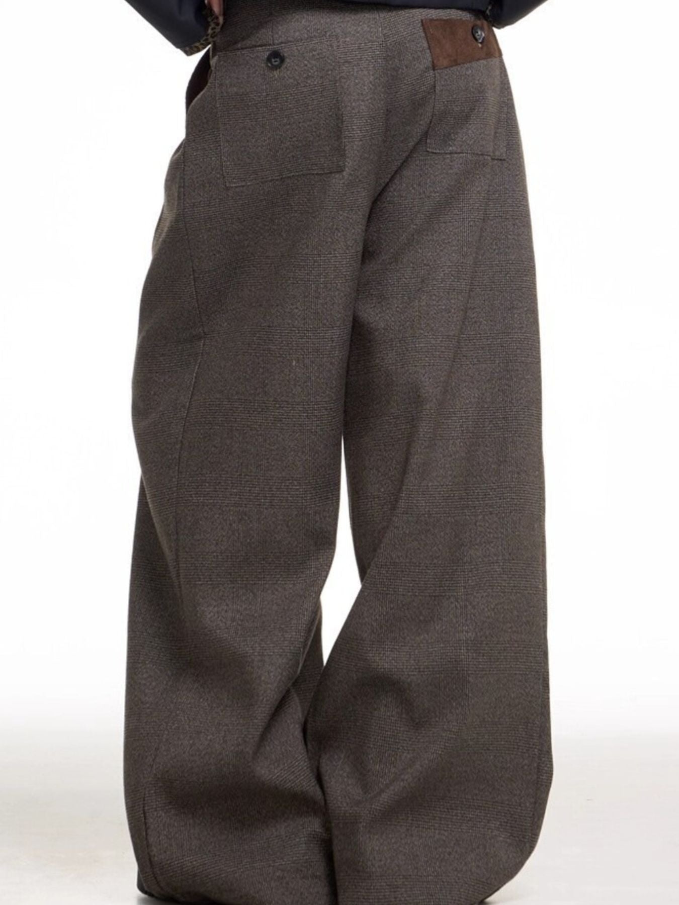 Plus size brown wide leg sweatpants with high waist and back pockets.