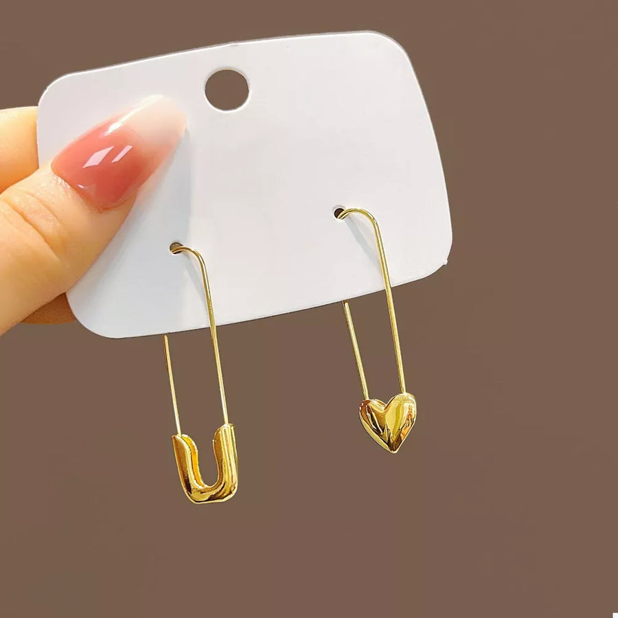 18K Gold-Plated,Alloy Care instructions: Avoid wearing during exercise, as sweat earrings in Gold with elongated silhouette