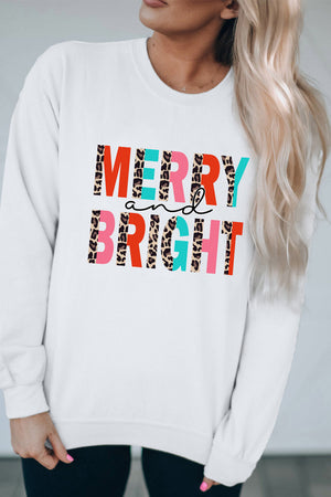 White crewneck sweatshirt with festive leopard print "Merry and Bright" graphic.
