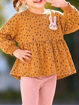 blush pink peplum top featuring applique and leopard