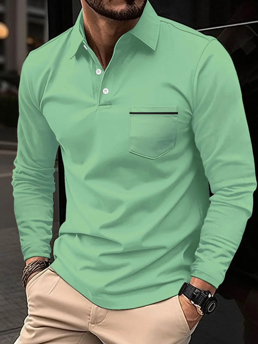 Long-sleeve polo shirt in Gum Leaf green with a chest pocket and black trim detail.