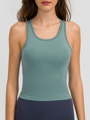 Turquoise ribbed racerback tank top with a scoop neck.