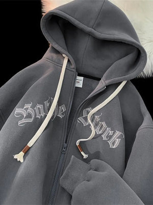 Gray zip-up hoodie with white gothic text graphic and drawstring hood
