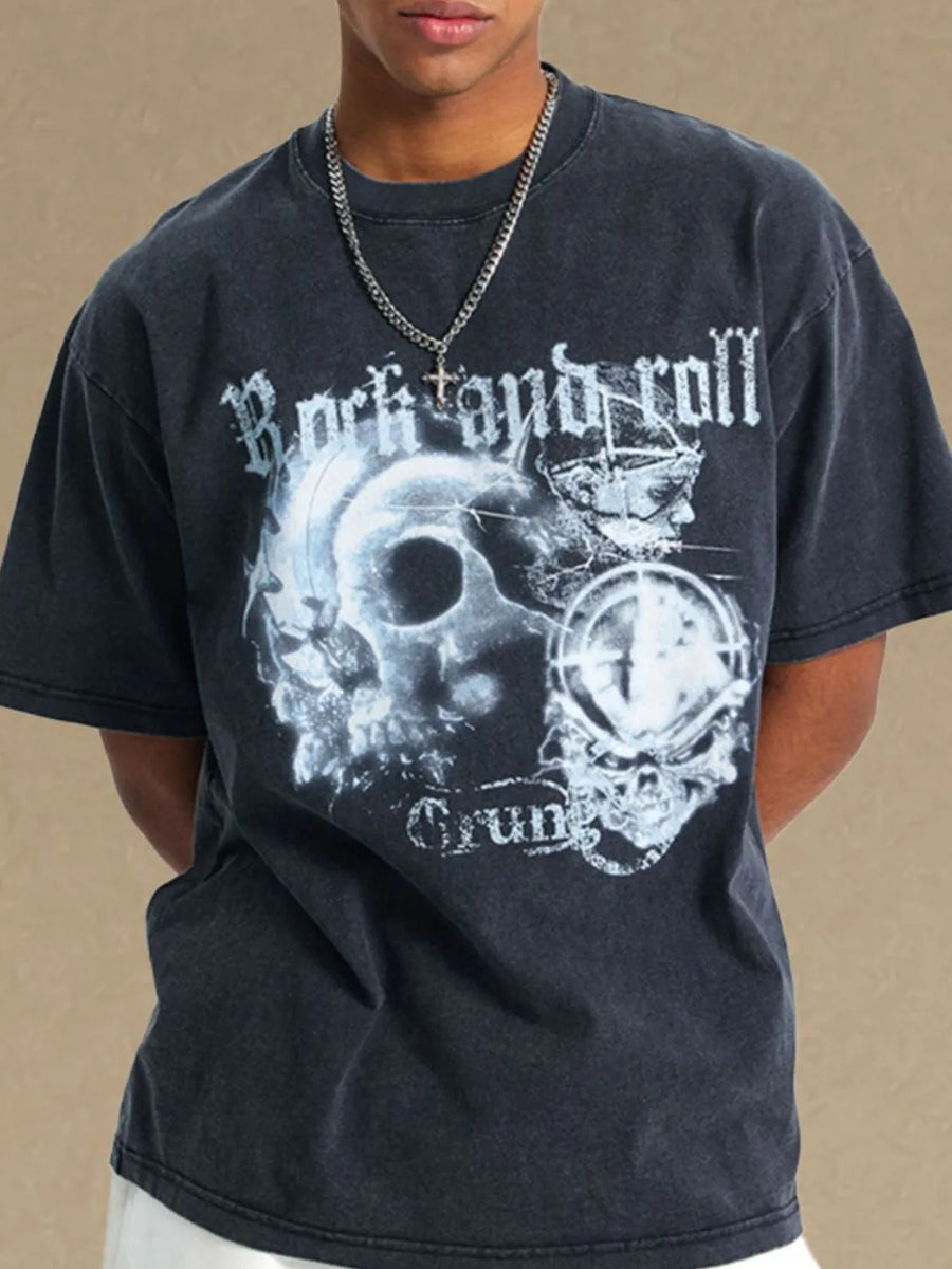 Black vintage rock graphic tee with skull and grunge print.